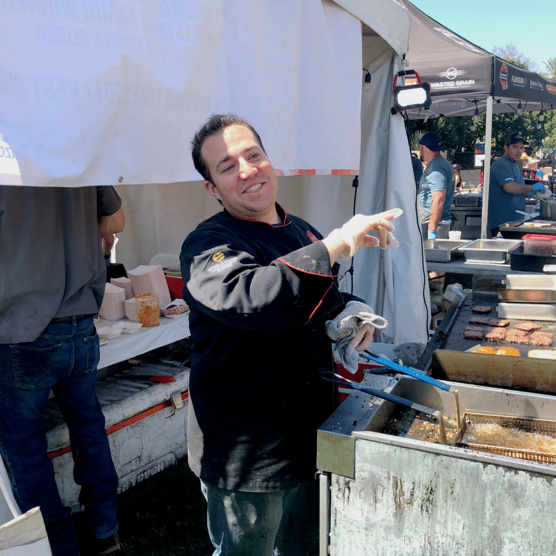 Aioli Gourmet Burgers Chef Tommy D'Ambrosio hard at work at the Scottsdale Culinary Festival